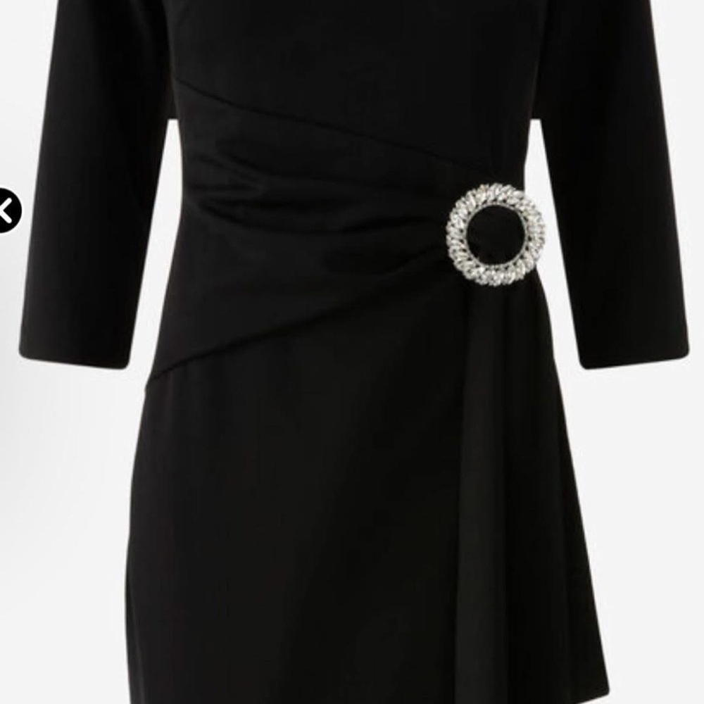 Elegant Black Dress with Embellished Detail